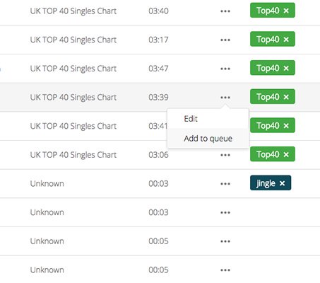 This is a white and green screenshot of the adding tracks to queue process.