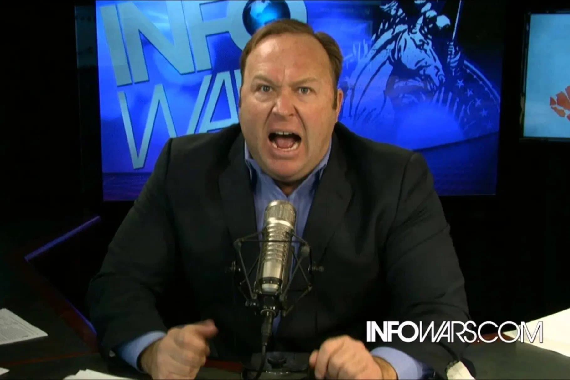 Image shows Alex Jones presenting his Info Wars show.