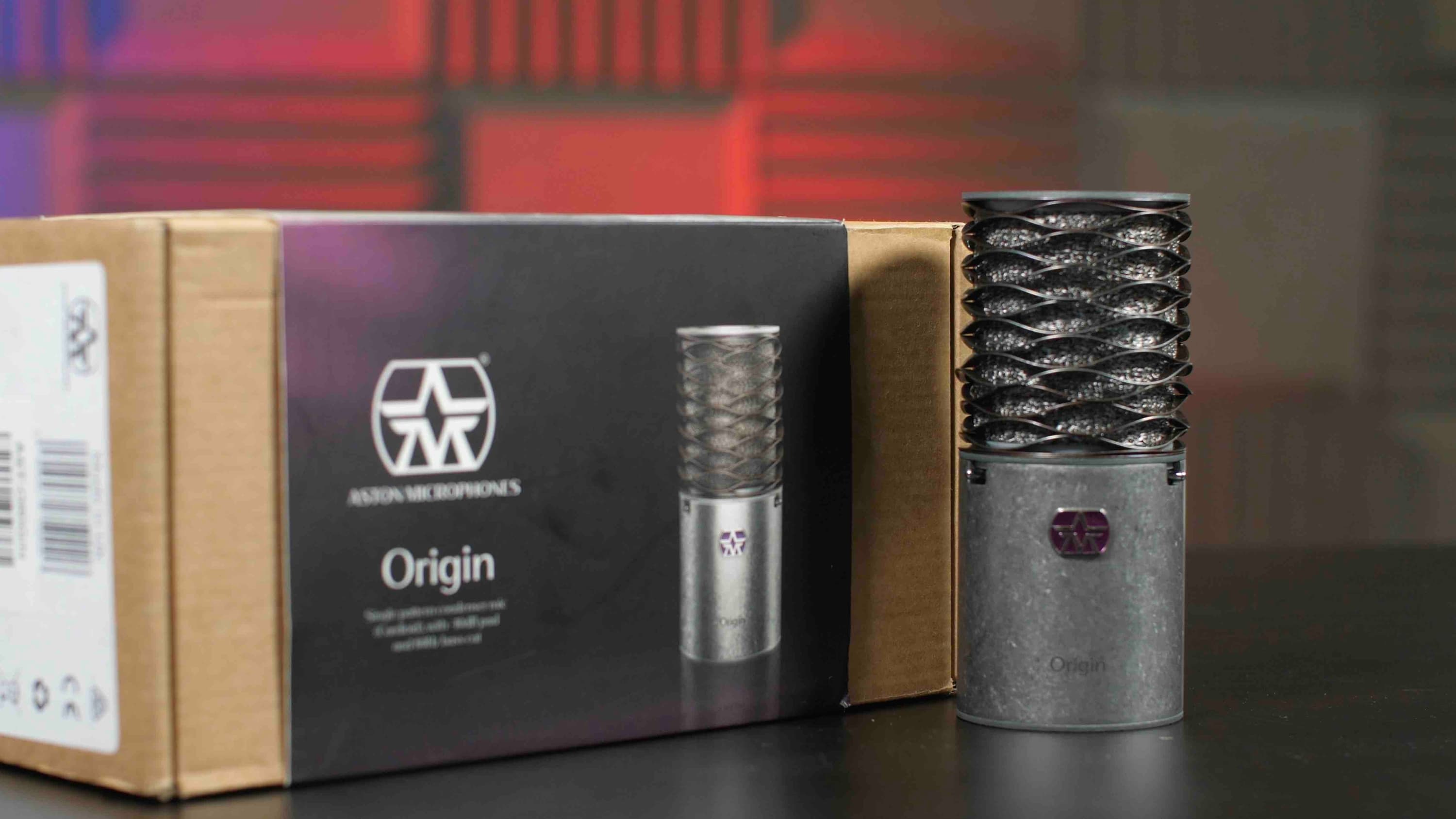 Image shows the Aston Origin mic next to it's box.