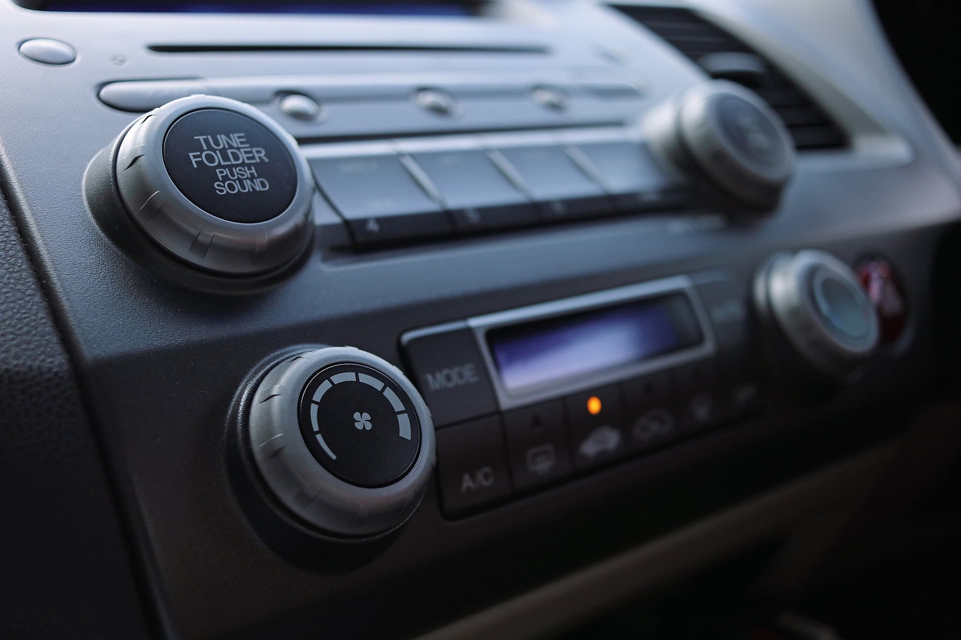 Image shows a close-up of a car-radio.