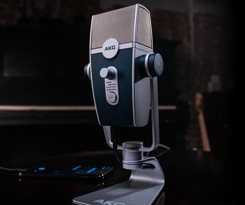 Image shows the blue and silver AKG Lyra microphone, in a radio studio.