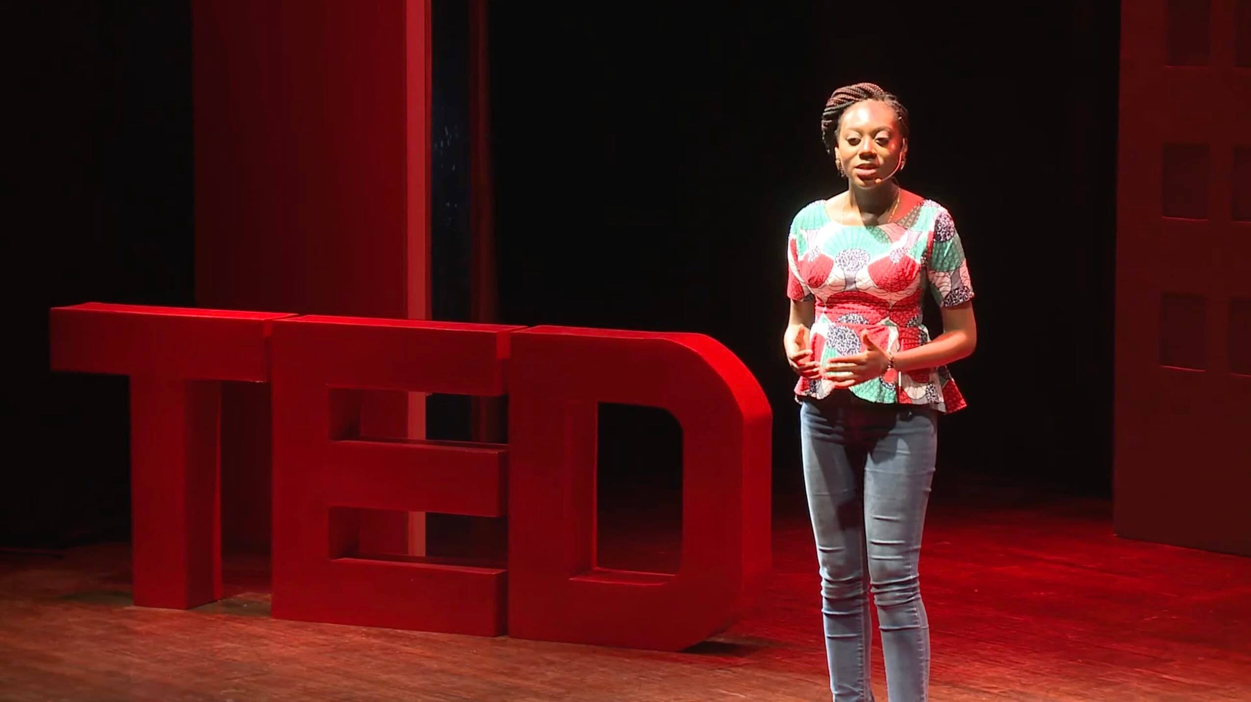 Image shows Obianuju Ndaguba giving her TED talk on conversation farming.