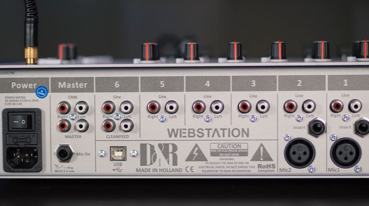 Image shows the back of a D&R WEBSTATION USB Mixer, where the inputs and outputs are.
