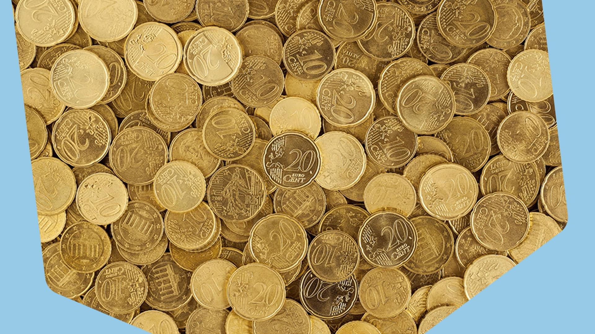 This is an image of gold, indecipherable coins, almost treasure-like in appearance. There are hundreds visible. The borders of the image are baby blue.