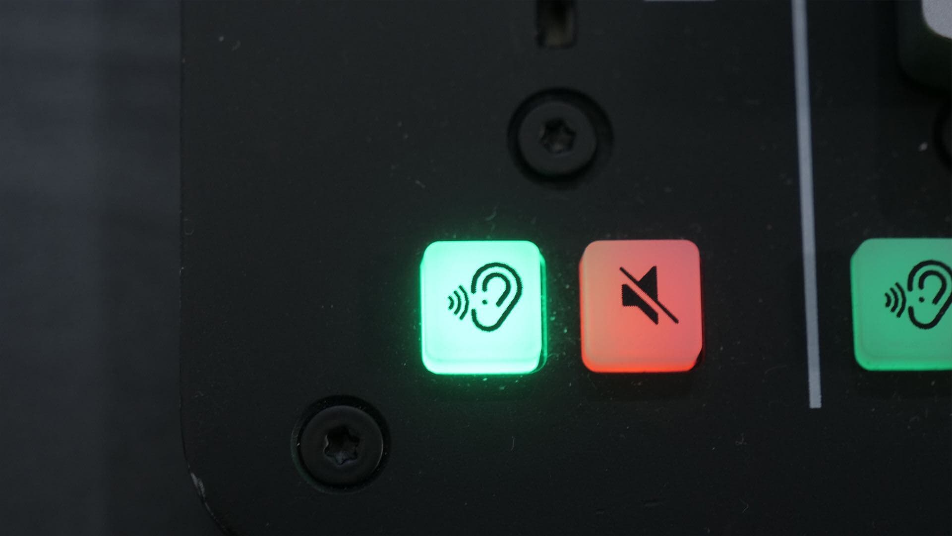 Image shows the monitoring buttons (Pre-Fade Listen and Mute) on the RODECaster Pro.