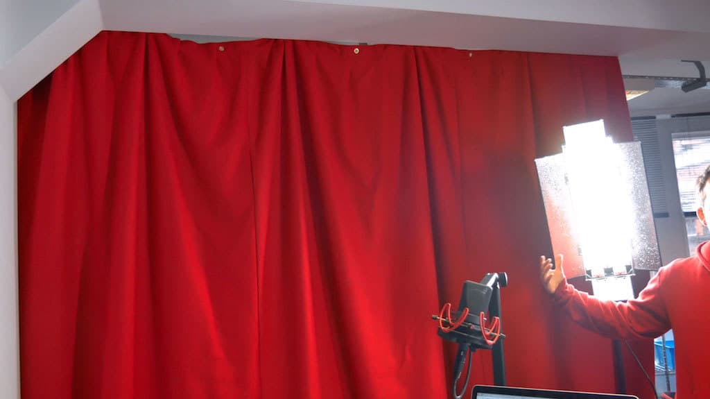 Image shows some a DIY soundproof curtain being used in a livestream.