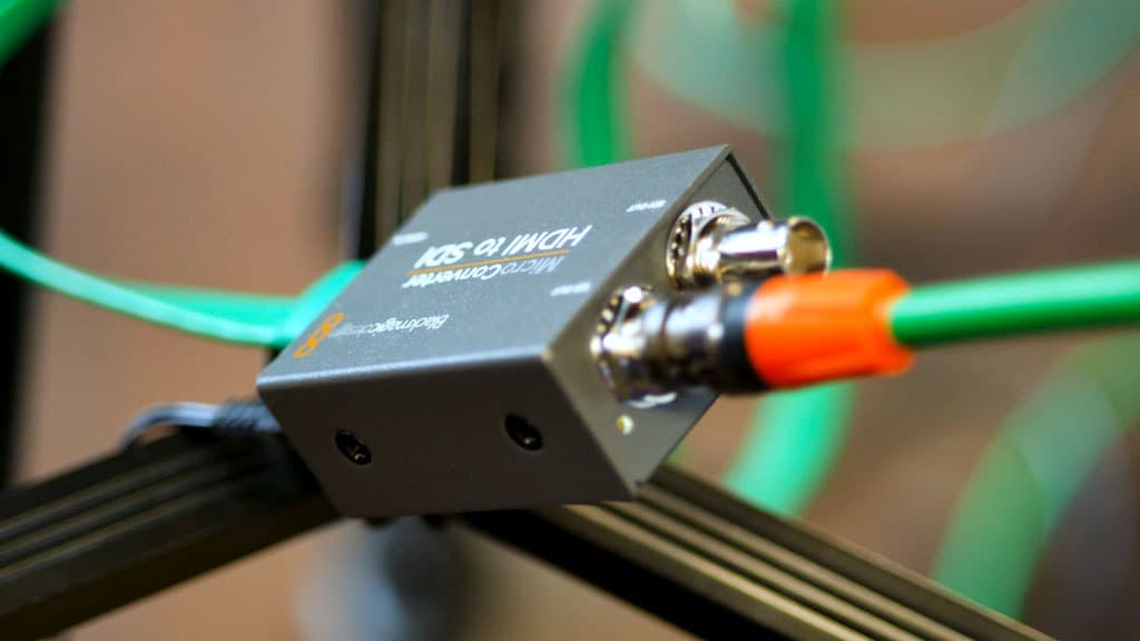 Image shows a close-up of a HDMI to SDI converter.