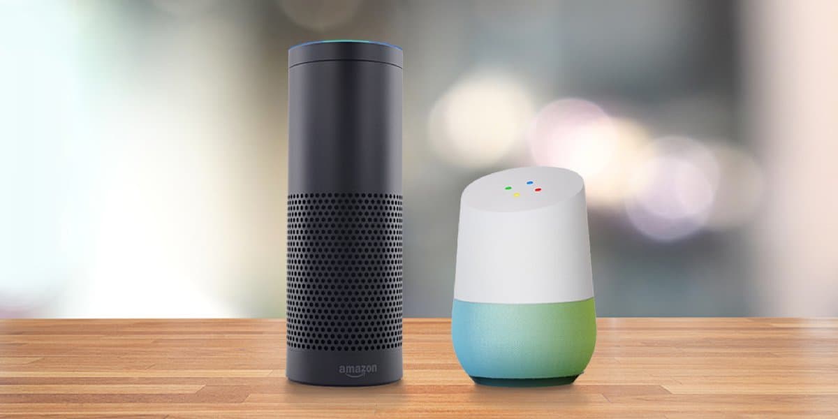Image shows 2 smart speakers on a computer.