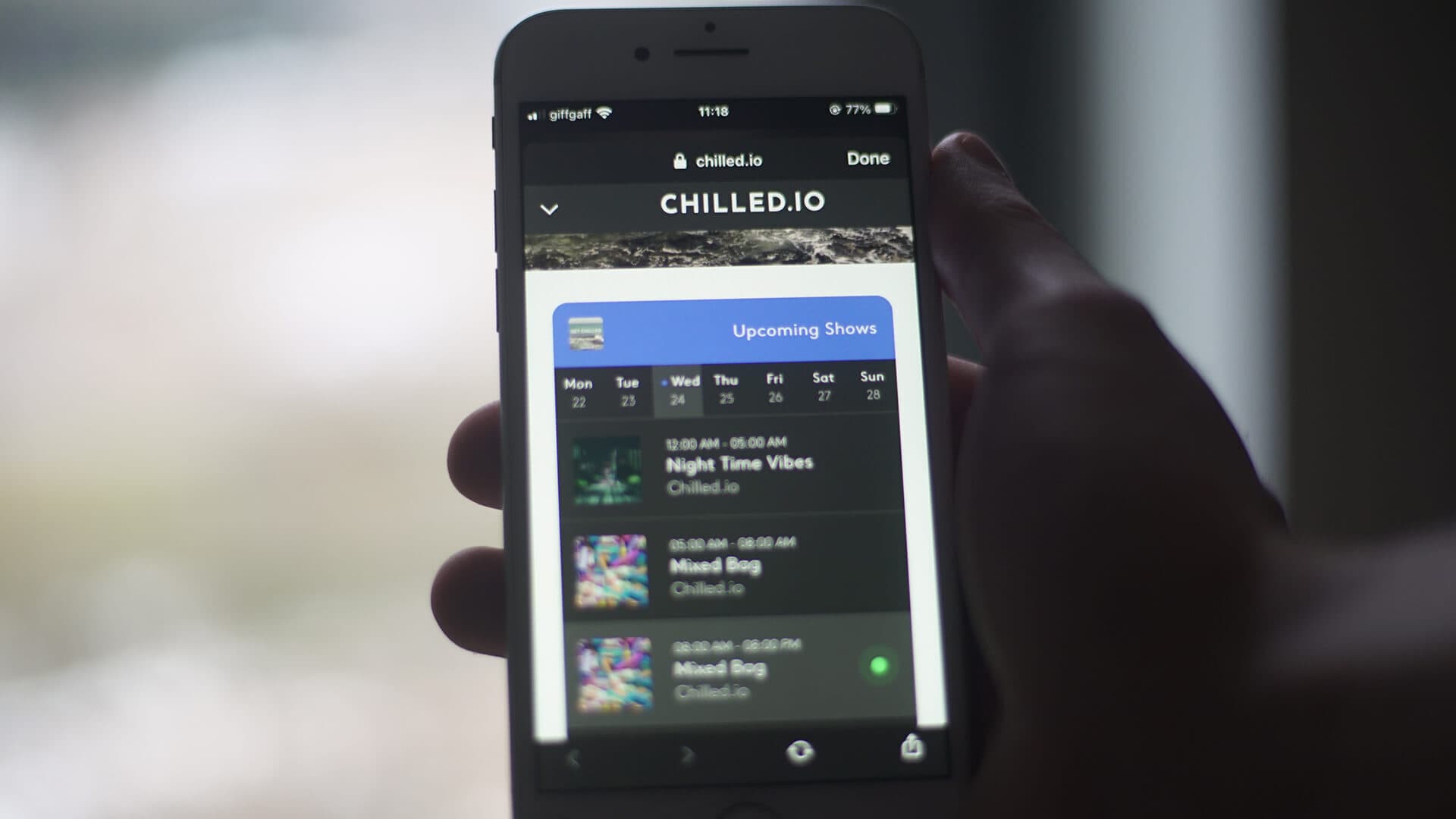 Image shows a mobile phone with the radio schedule open.