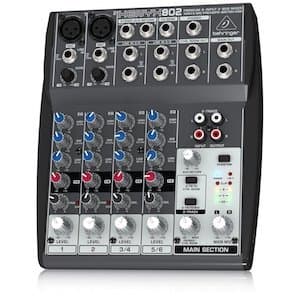 Image shows a Behringer XENYX 802 mixer against a white background.