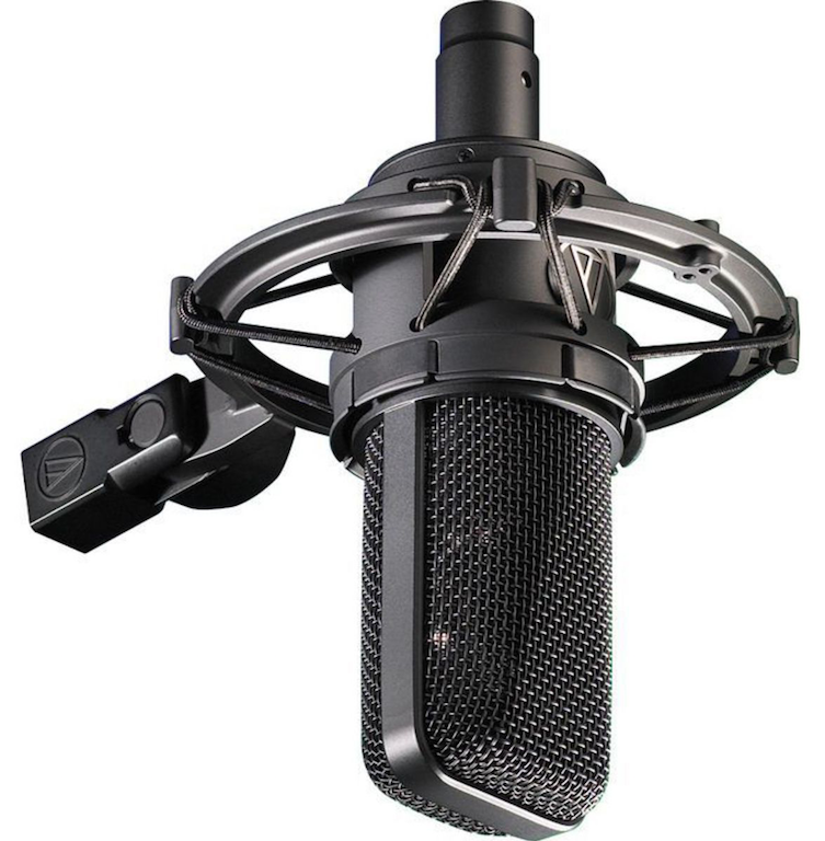This is a stock image of a Audio Technica AT4033ASM, a microphone with a square end, against a plain white backdrop.