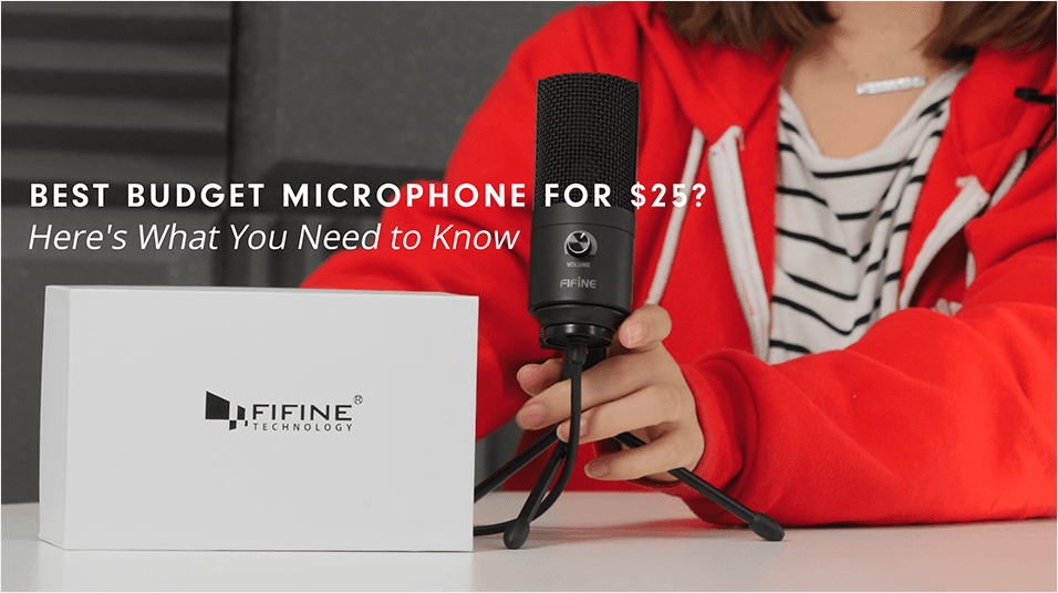 This is a picture of a person with a brown bob and only the tips of their hair showing in the image. They have a red hoodie and white striped shirt on. They are sat in front of a microphone and a white kit box.Best Budget Microphone