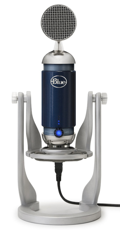This is a stock image against a plain white backdrop of a Blue Spark Microphone. It is stood vertical upright on a stand with two legs and a small silver base.