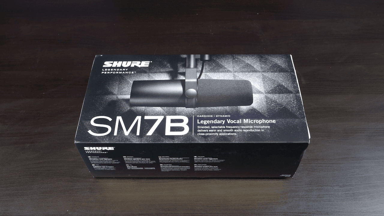 Image shows a Shure SM7B box on a desk.