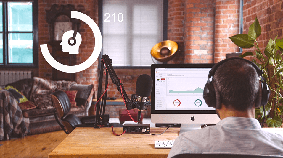This is a warmly lit image of a home studio, with a man wearing headphones sat at a Macbook in the forefront of the shot. There is a white circular webinar logo in the left hand side.