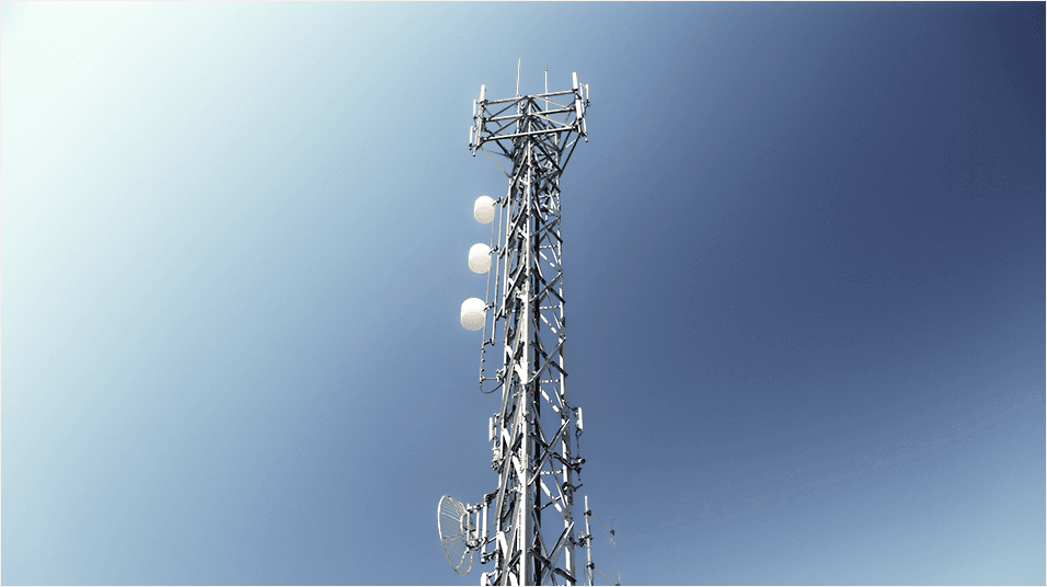 There is a plain blue sky backdrop, and in the centre of the image is a silver radio tower with white knobs visible.