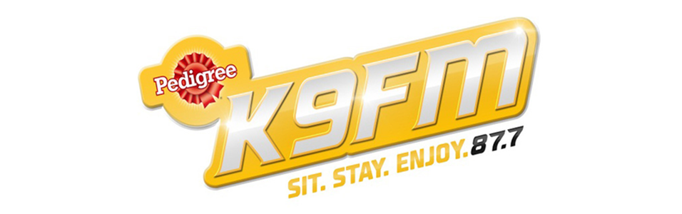 This is Pedigree's K9FM logo, a yellow and silver logo with the Pedigree rosette in the top left.