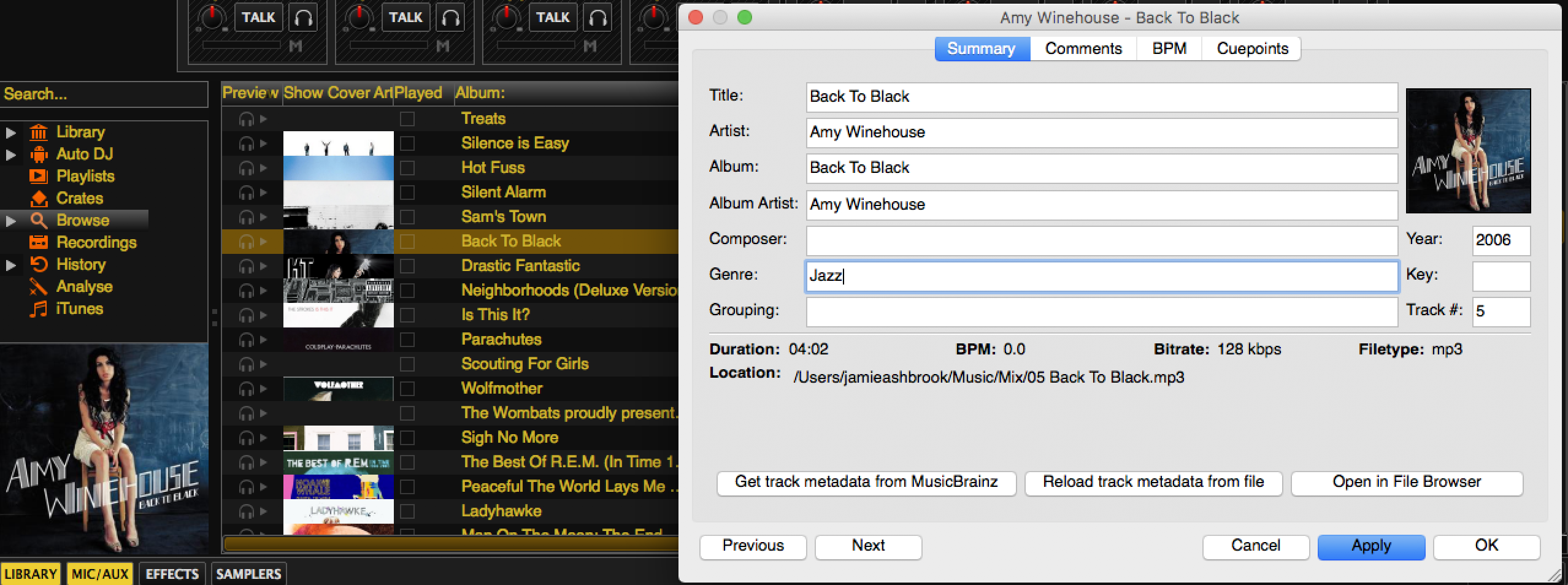 This is a screenshot visualising the Mixxx Music Library, with a grey popup listing Album & Genre etc.