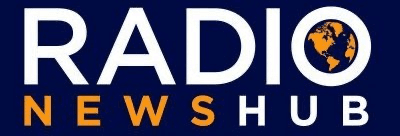 Image is a banner logo for Radio News Hub. It has a navy blue background, with the word "RADIO" in white font at the top. The letter 'o' has a global map within it. Underneath is the word "NEWS" in orange font and "HUB" in white font.
