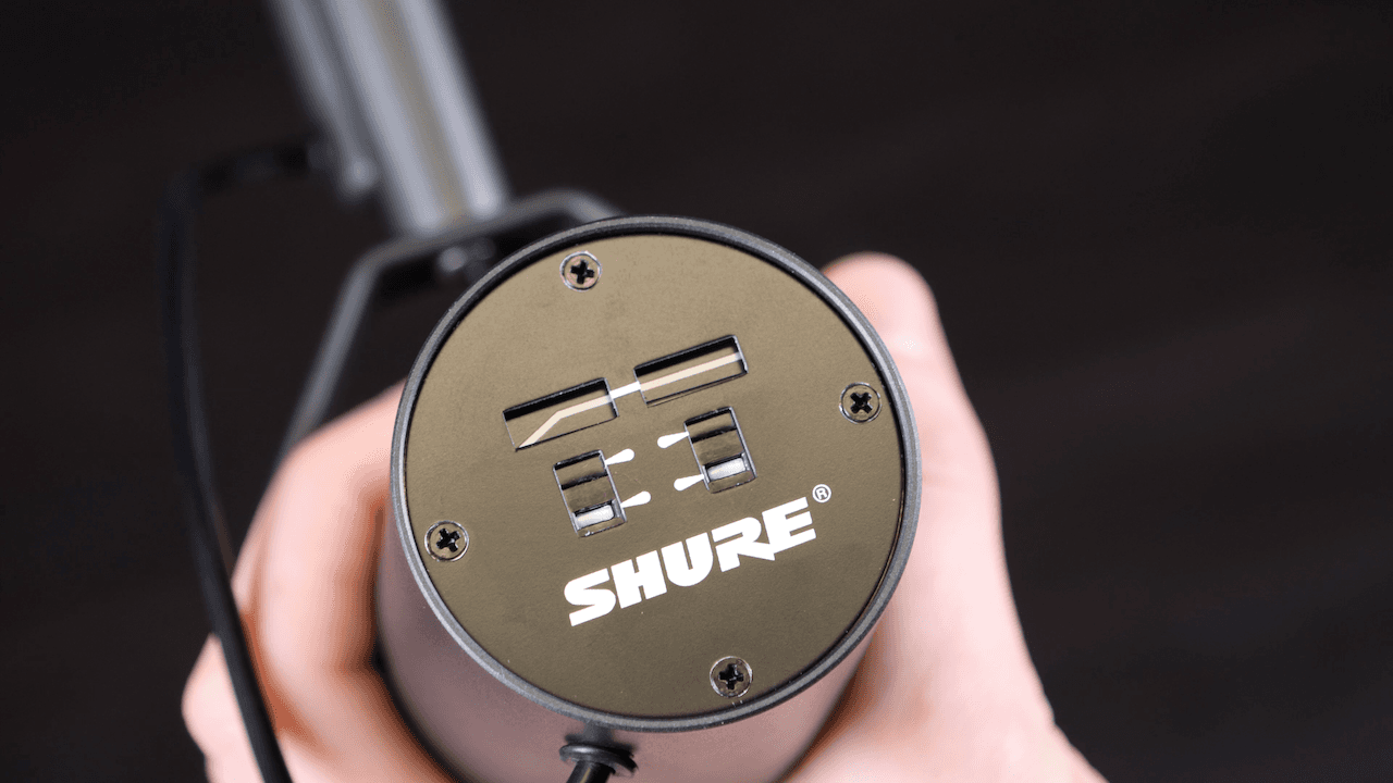 Image shows the back of a Shure SM7B where they're some setting switches.